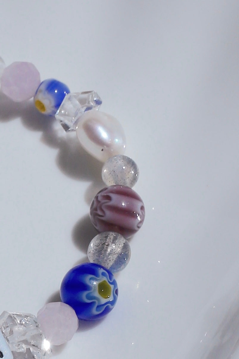 Close-up of Florence bracelet beads: glass Murano and freshwater pearl charms