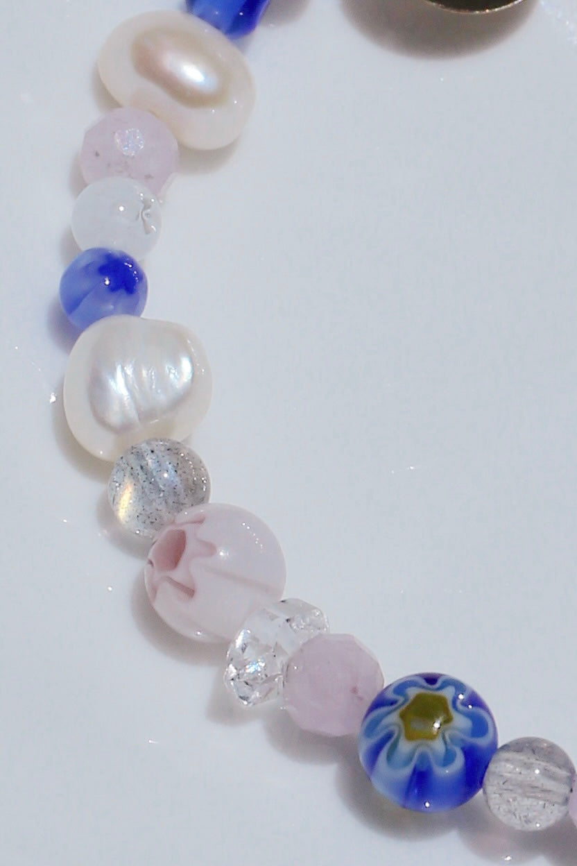 Detail close-up of Florence bracelet beads - pearls and multi-colored glass beads