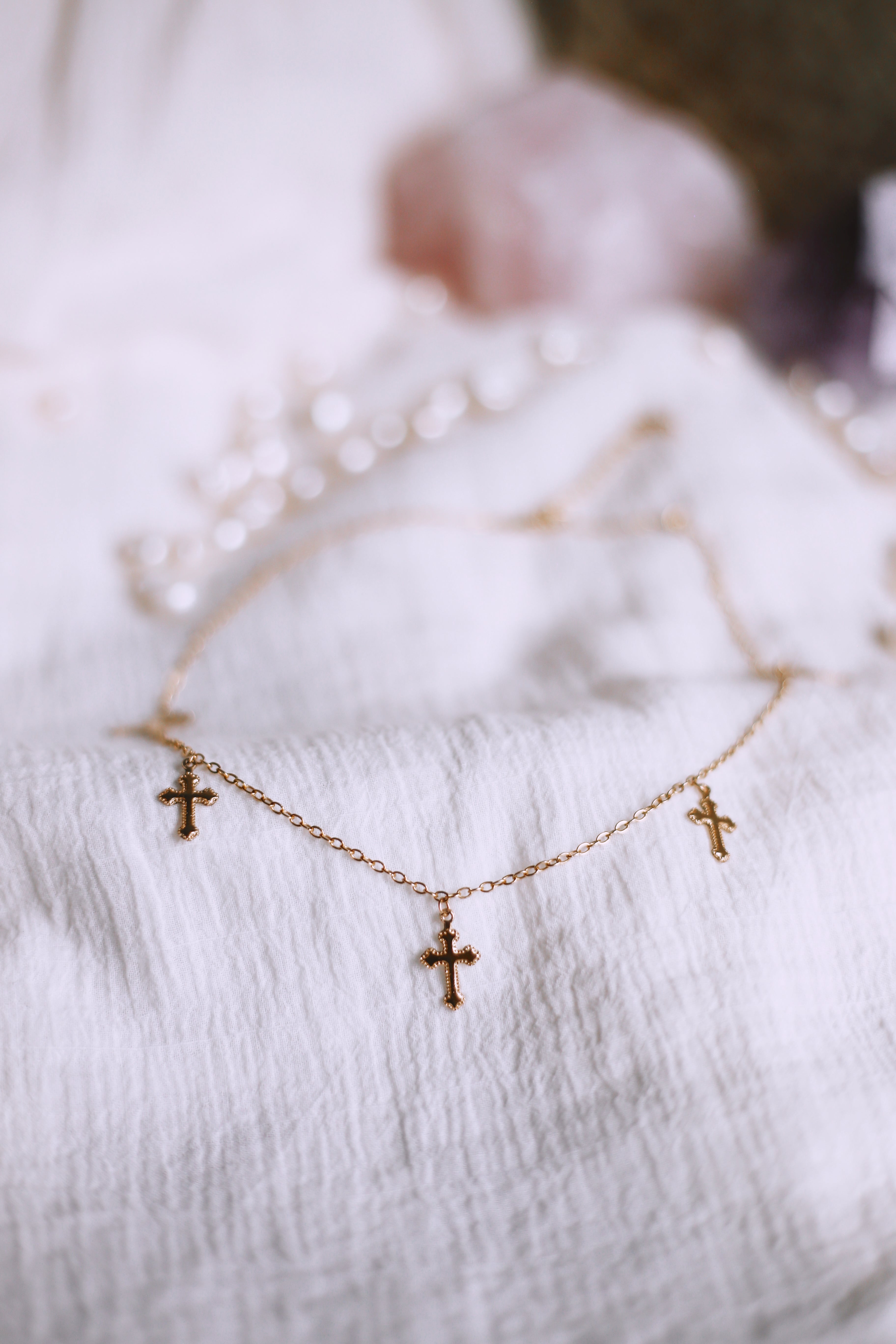 Faith 5 Gold Filled Crosses on Gold Chain Necklace Bokeh