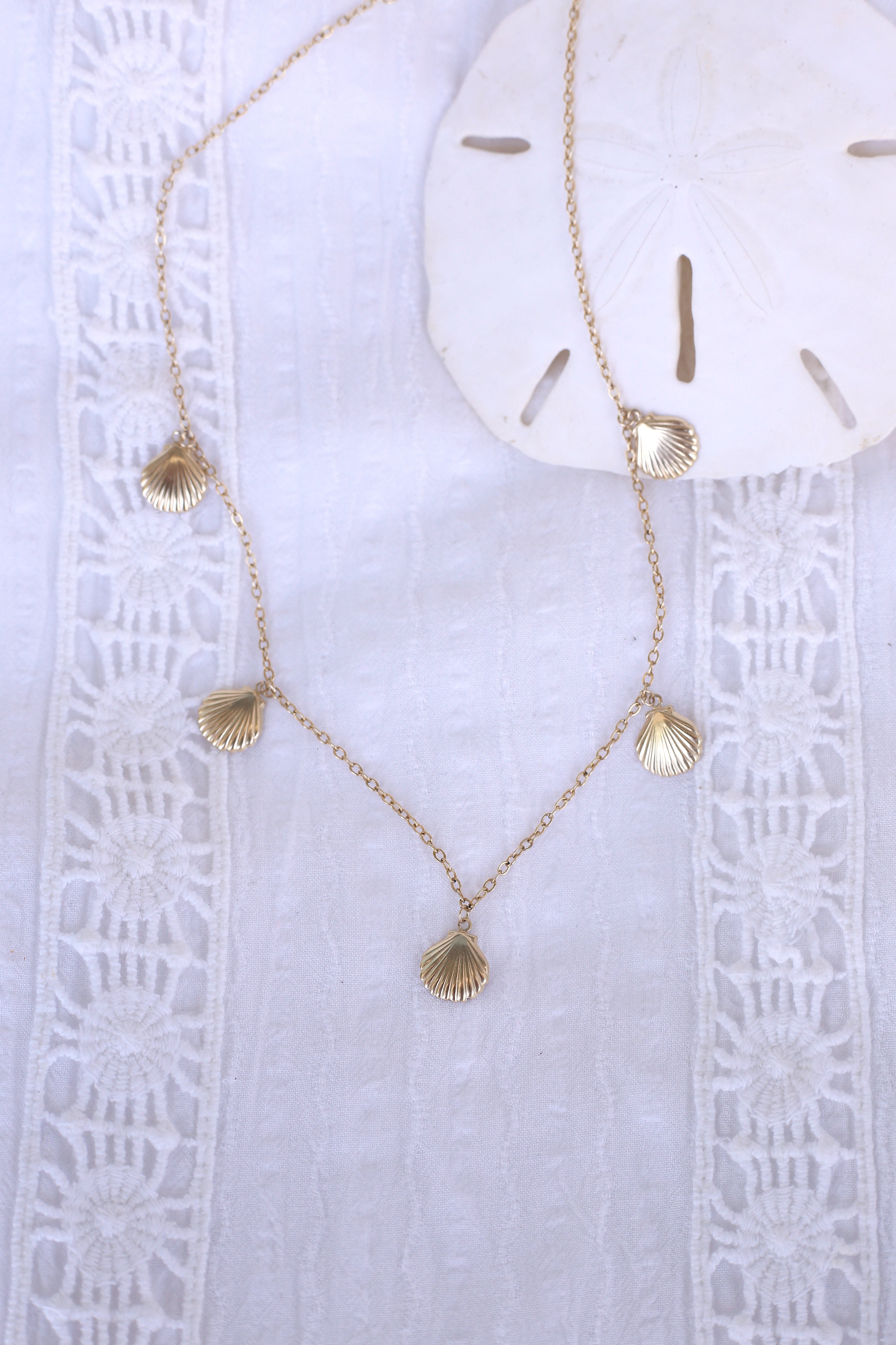 Isla 5 Gold Scallop Seashell Charm on Gold Chain Necklace Flat Lay